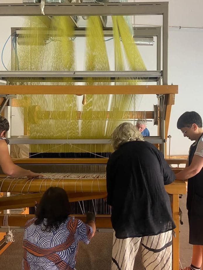people at the loom